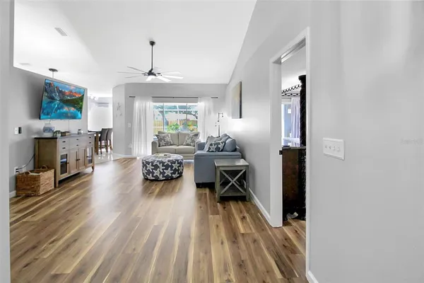 a view of livingroom with hardwood floor and hallway
