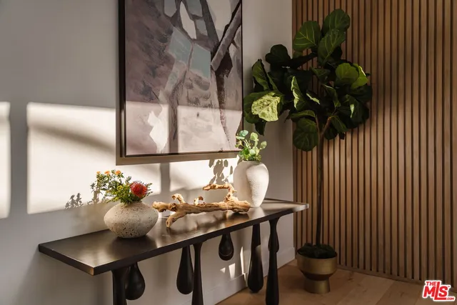 a vase of flowers sitting on a table