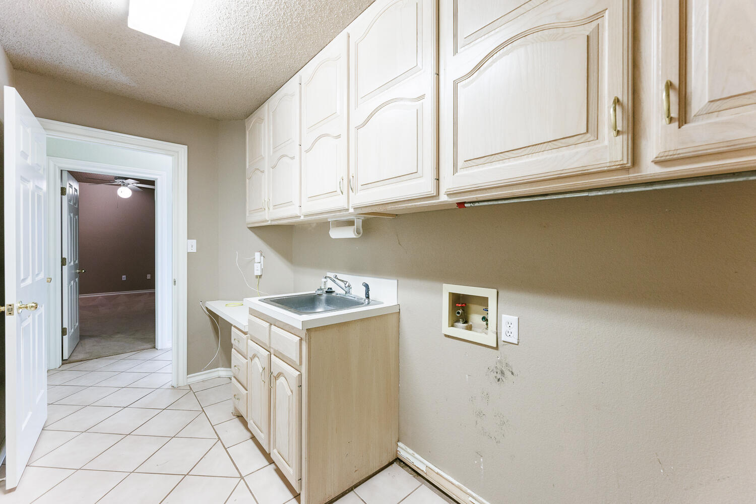 206 Collins Avenue Sundown, TX 79372 - Photo 57 of 82 a kitchen with stainless steel appliances granite countertop a sink and a cabinets