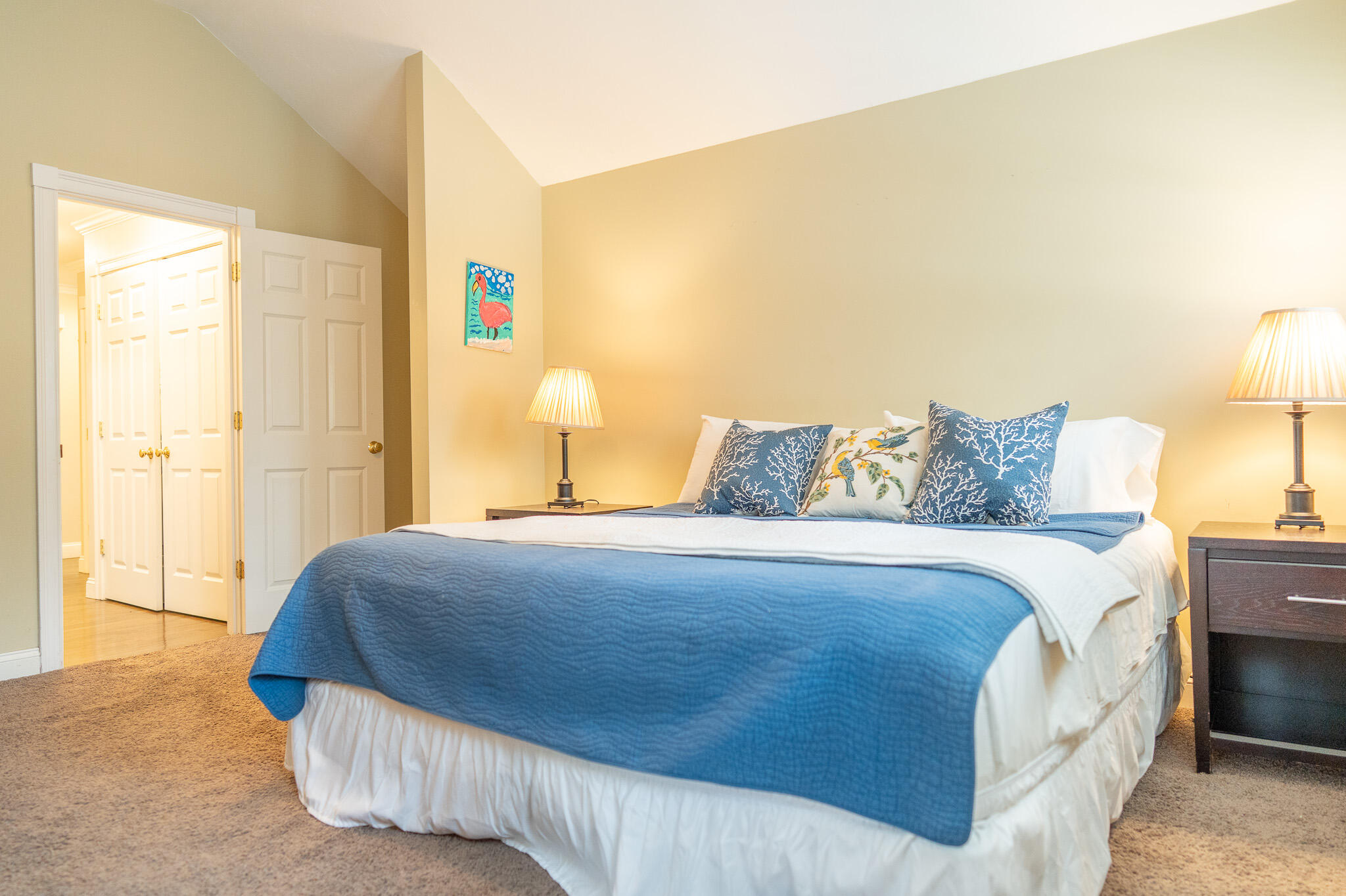 10 Abbey Gate Road Cotuit, MA 02635 - Photo 26 of 67 a bedroom with a bed and a lamp
