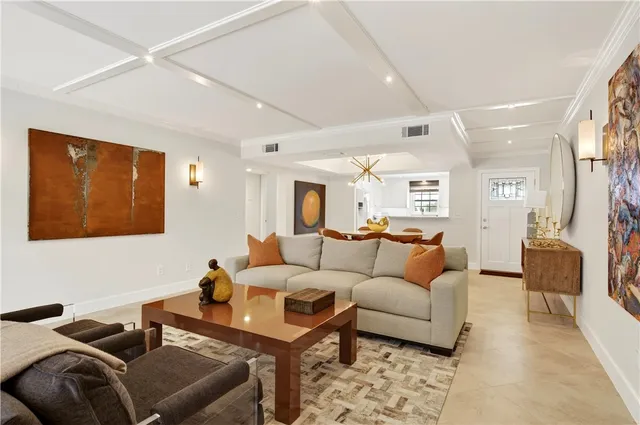 a living room with furniture and a couch