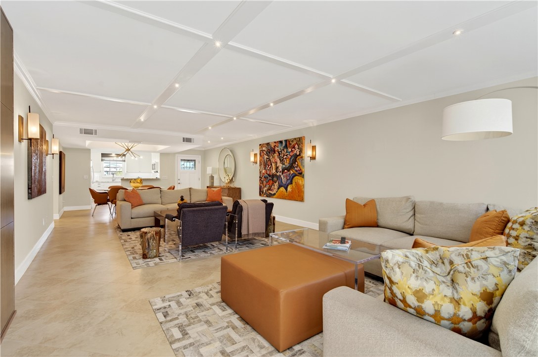 2743 Ocean Drive, Unit 50E Vero Beach, FL 32963 - Photo 14 of 36 a living room with furniture and wooden floor