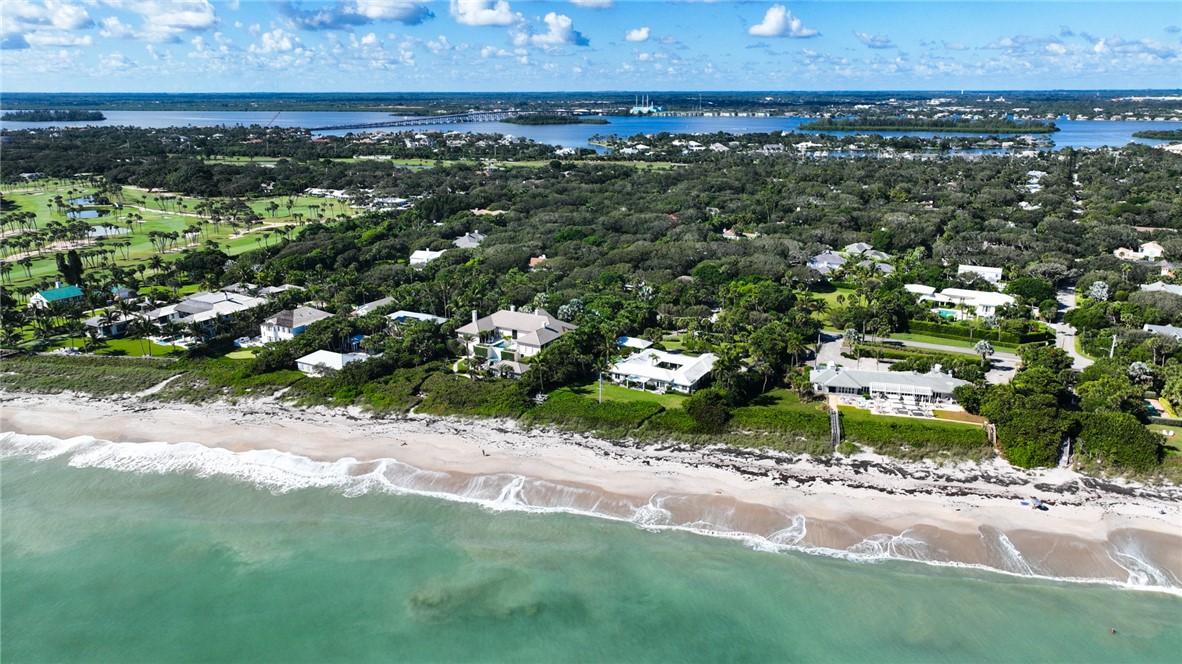 2743 Ocean Drive, Unit 50E Vero Beach, FL 32963 - Photo 34 of 36 a view of a yard with an outdoor space