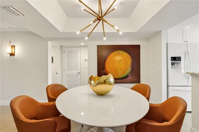 a living room with furniture and a clock