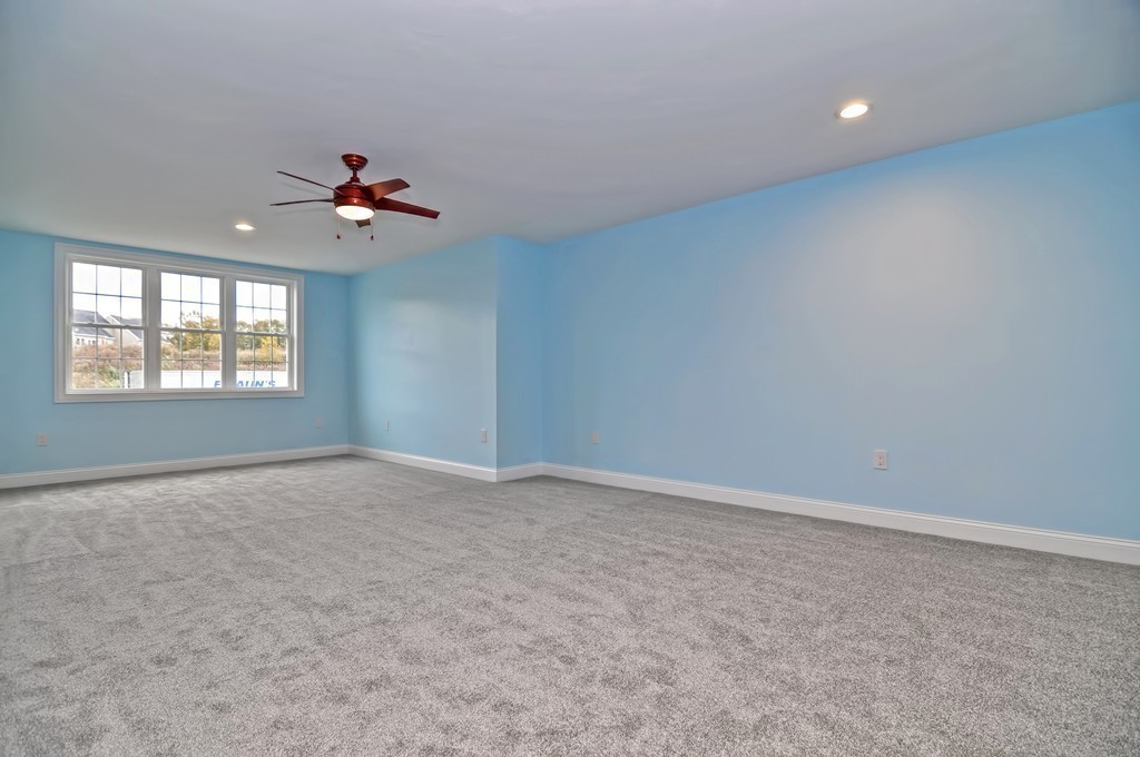87 Ariel Circle Sutton, MA 01590 - Photo 18 of 30 a view of an empty room with a window