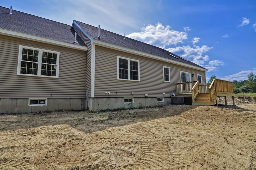 87 Ariel Circle Sutton, MA 01590 - Photo 27 of 30 a house view with a backyard space
