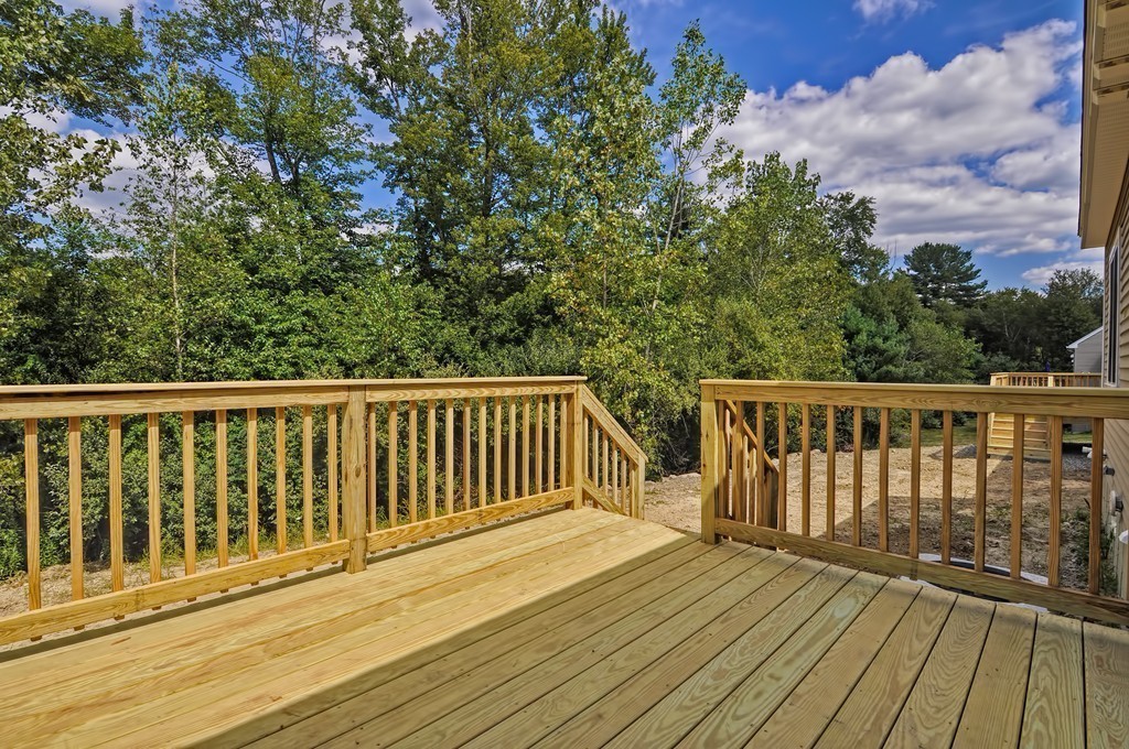 87 Ariel Circle Sutton, MA 01590 - Photo 30 of 30 a view of deck and wooden floor