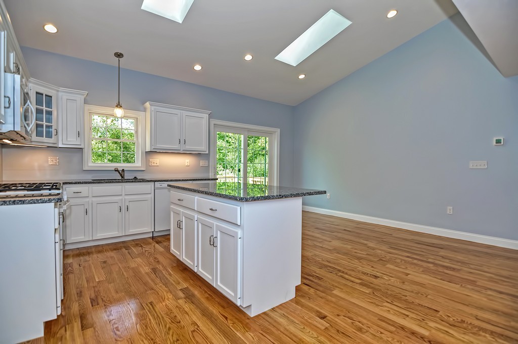 87 Ariel Circle Sutton, MA 01590 - Photo 3 of 30 a kitchen with stainless steel appliances granite countertop a white cabinets a sink and a dishwasher
