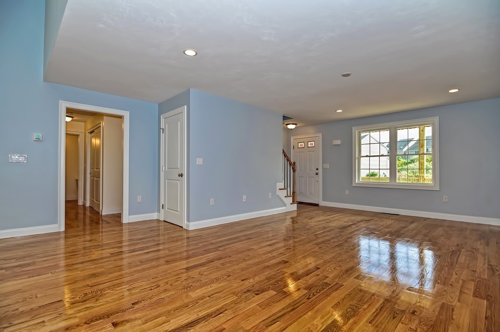 87 Ariel Circle Sutton, MA 01590 - Photo 6 of 30 a view of an empty room and window