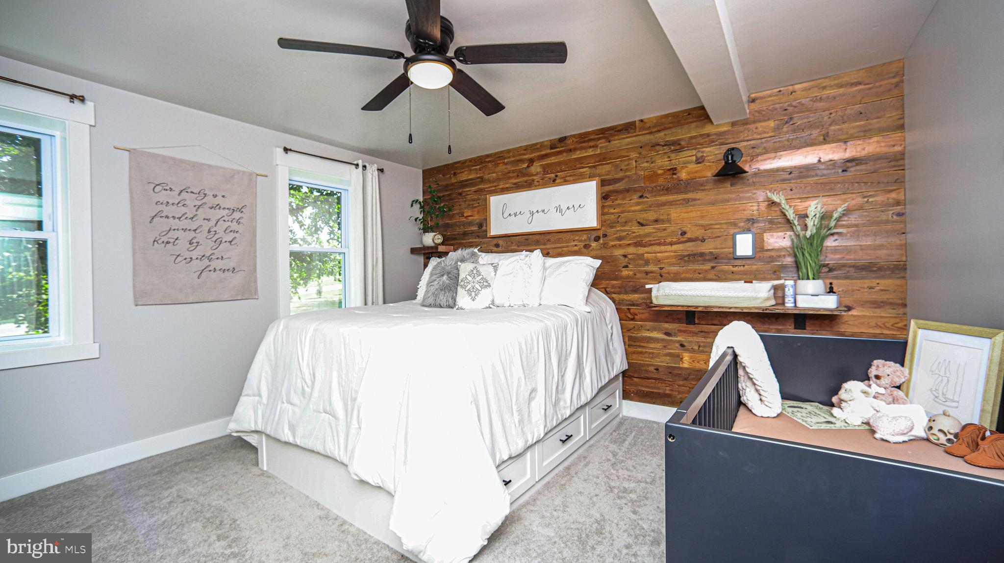 1203 Roxbury Road Newburg, PA 17240 - Photo 13 of 64 a bed room with a bed and a chandelier