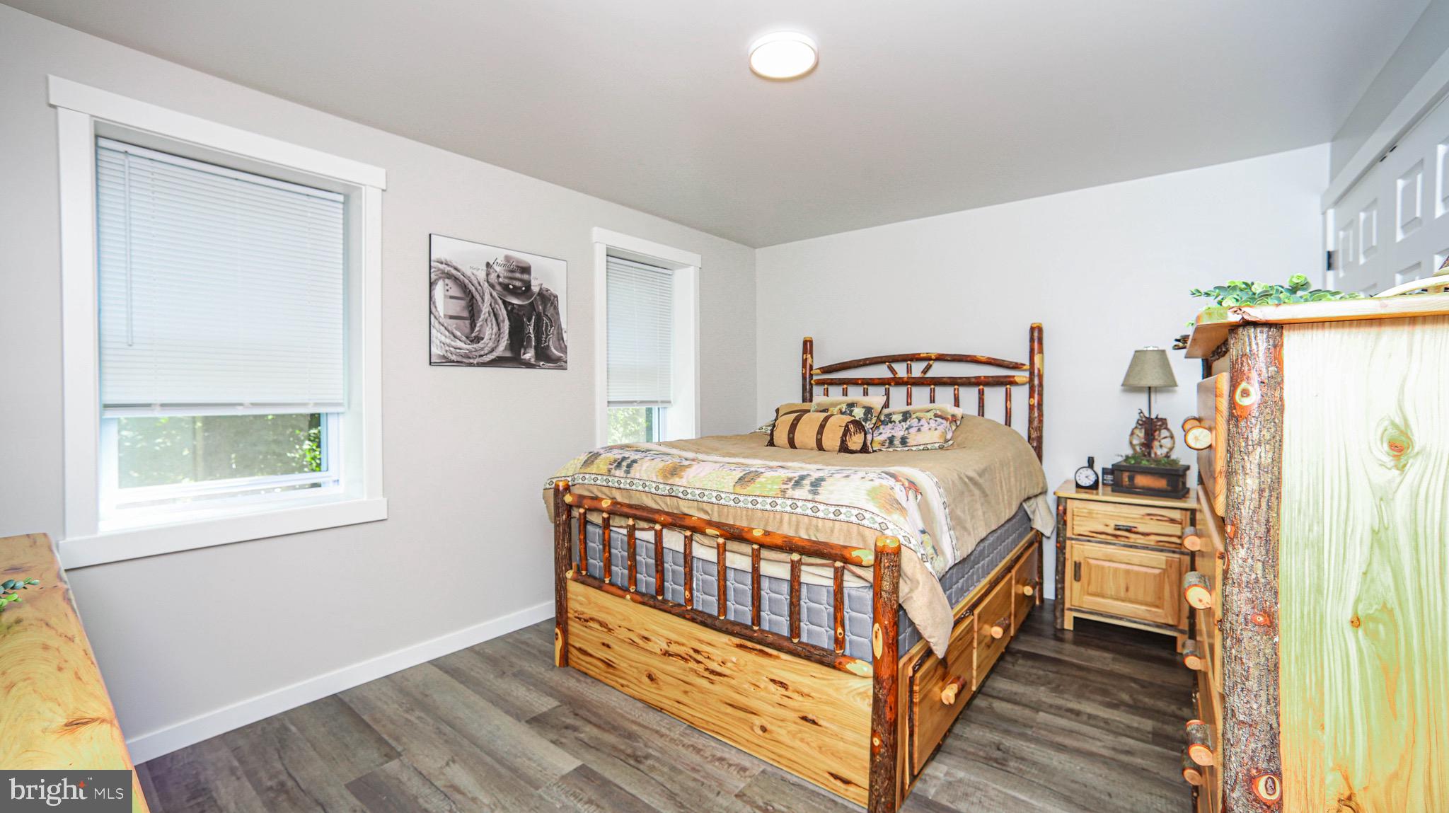 1203 Roxbury Road Newburg, PA 17240 - Photo 19 of 64 a bedroom with a bed and a window