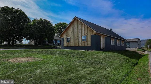 a view of balcony with wooden floor