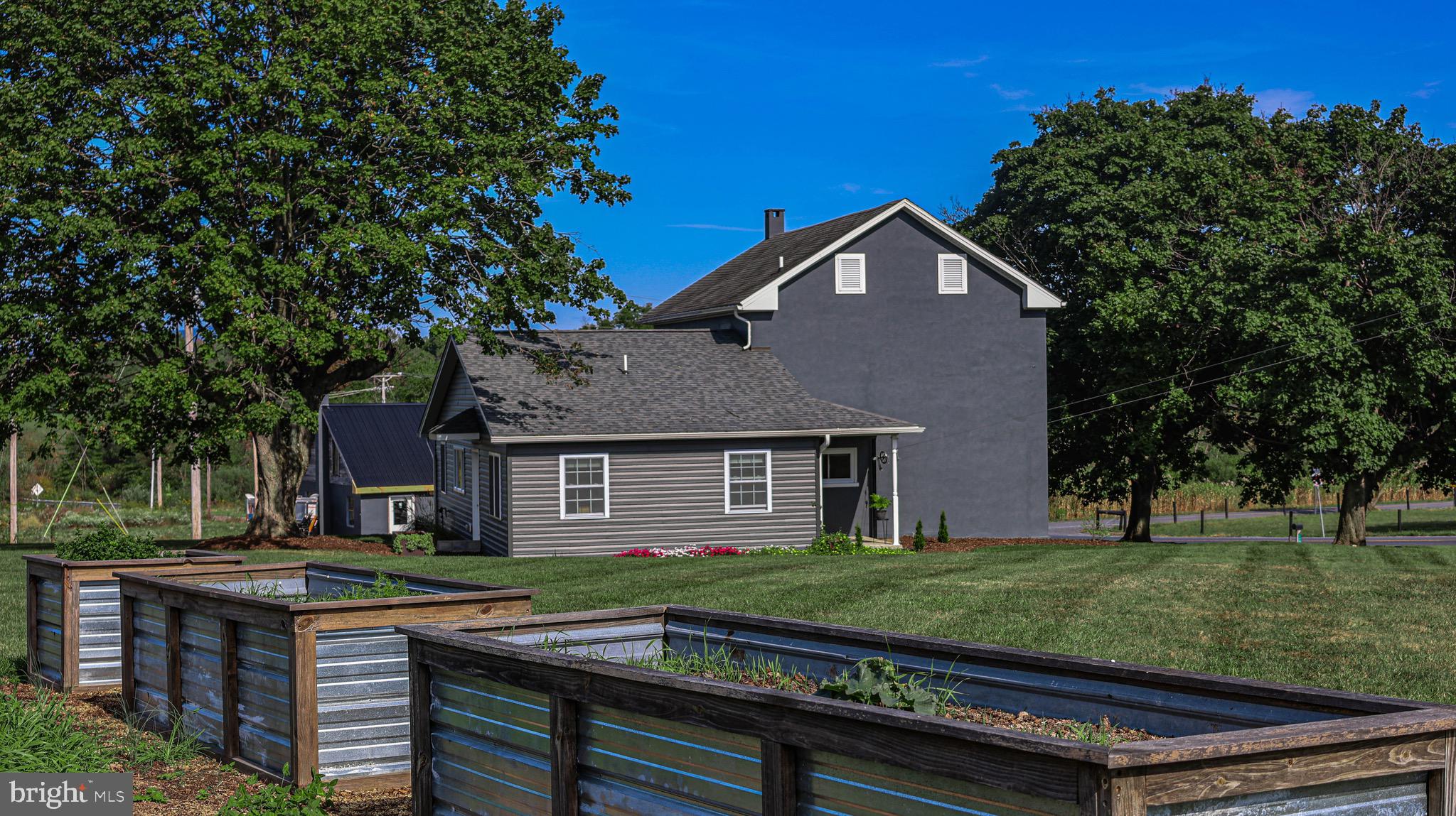1203 Roxbury Road Newburg, PA 17240 - Photo 33 of 64 a front view of a house with a yard