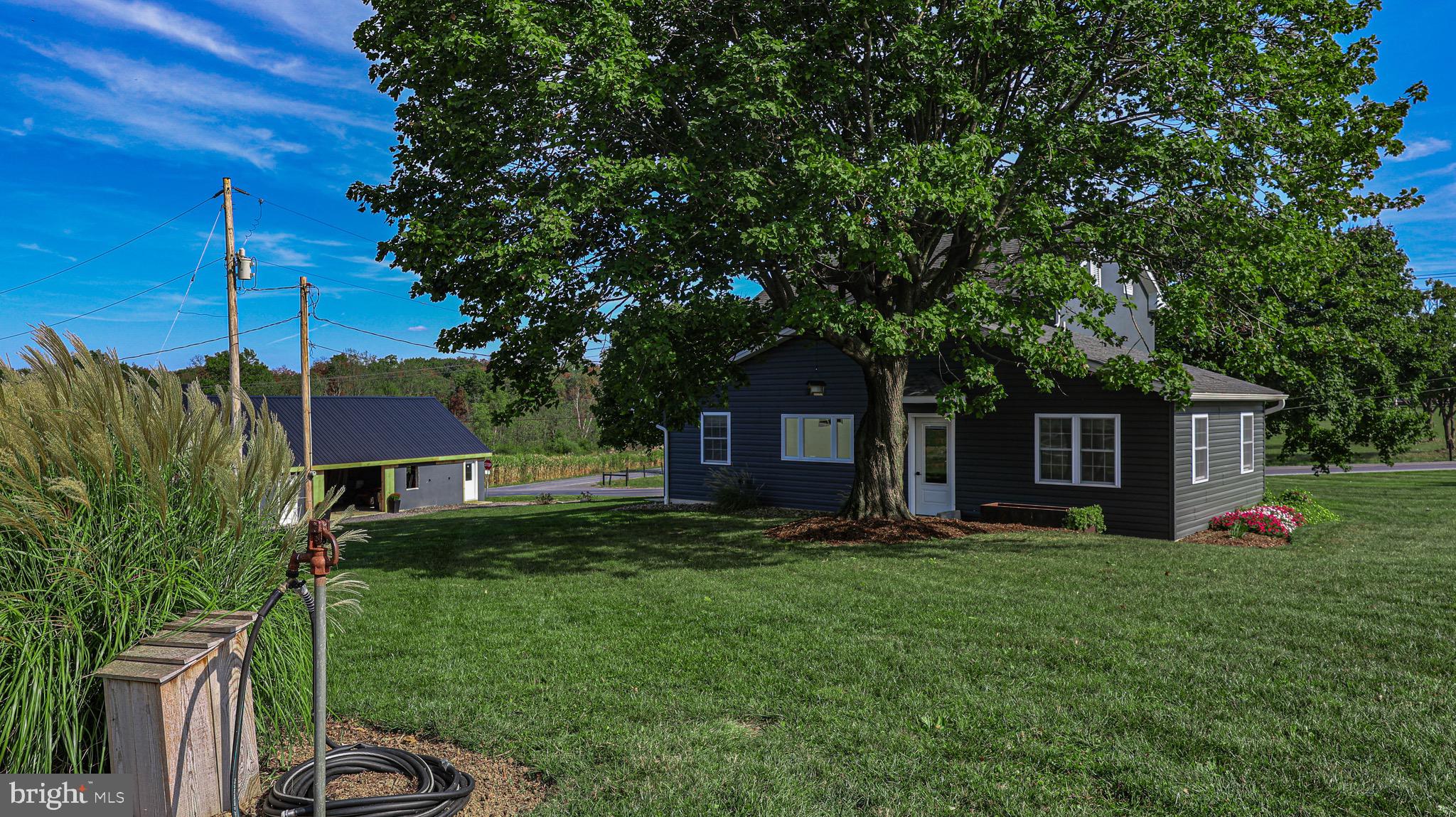 1203 Roxbury Road Newburg, PA 17240 - Photo 38 of 64 a front view of house with yard and green space