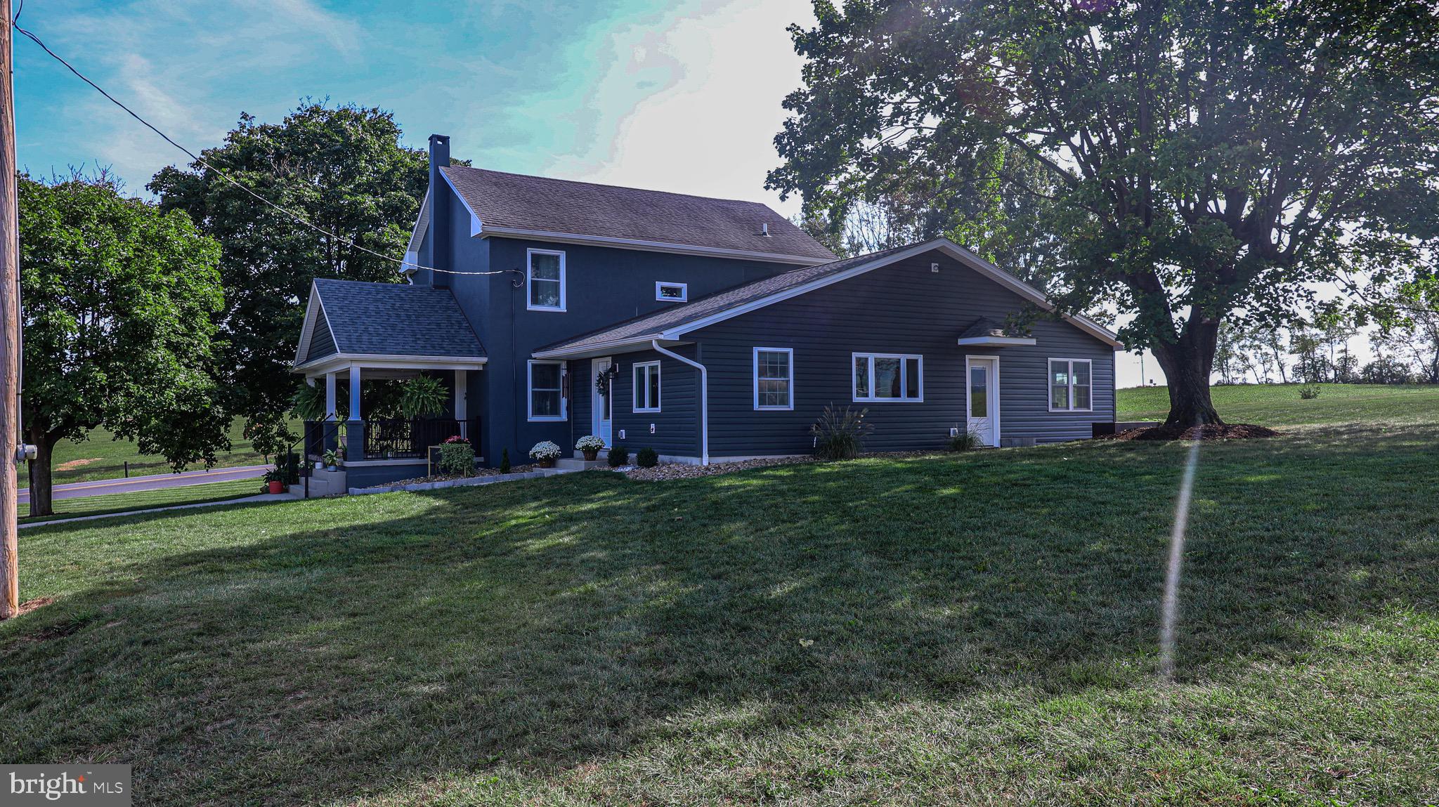 1203 Roxbury Road Newburg, PA 17240 - Photo 41 of 64 a front view of a house with garden