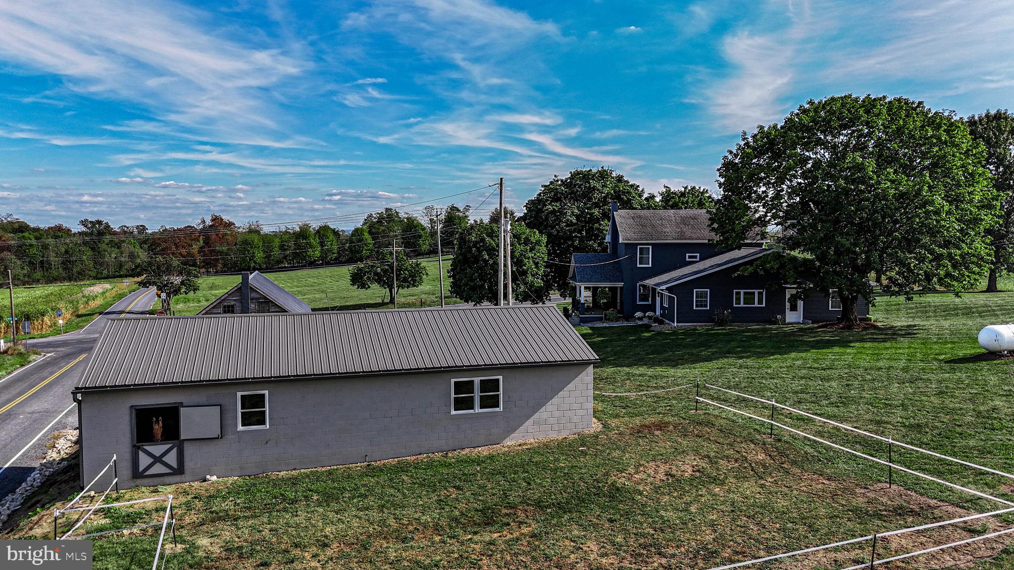 1203 Roxbury Road Newburg, PA 17240 - Photo 48 of 64 an aerial view of a house with a yard