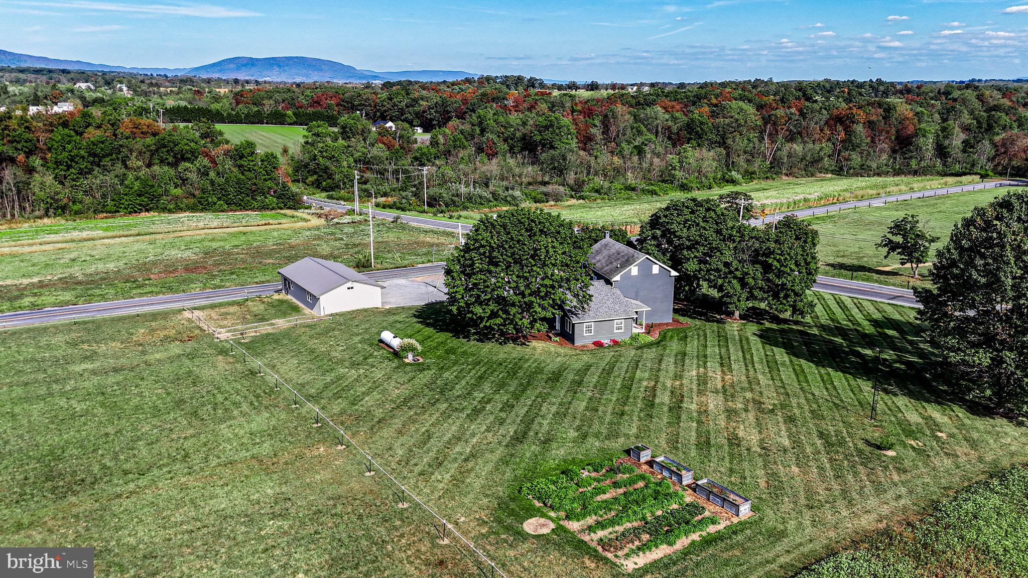 1203 Roxbury Road Newburg, PA 17240 - Photo 54 of 64 an aerial view of a golf course with a yard