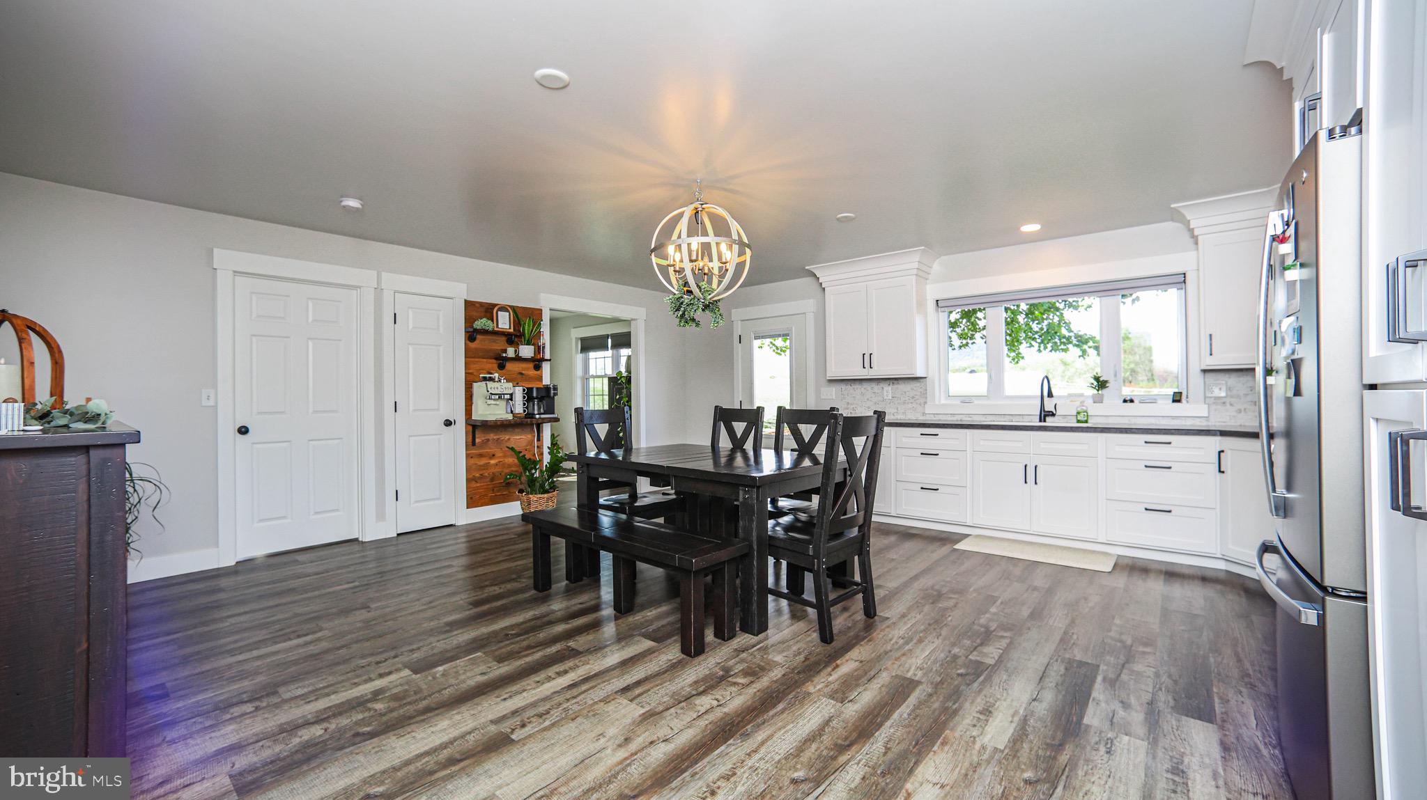 1203 Roxbury Road Newburg, PA 17240 - Photo 6 of 64 a view of a dining room with furniture window and wooden floor
