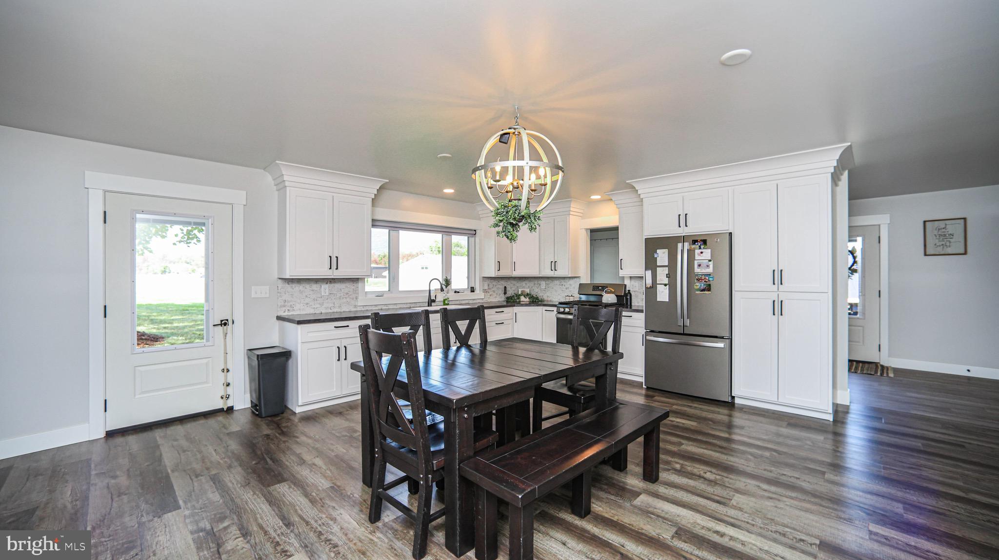 1203 Roxbury Road Newburg, PA 17240 - Photo 8 of 64 a view of a dining room with furniture window and wooden floor