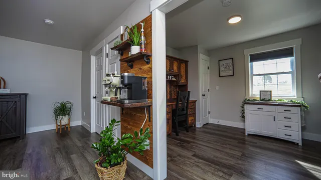 a bed room with a bed and a chandelier