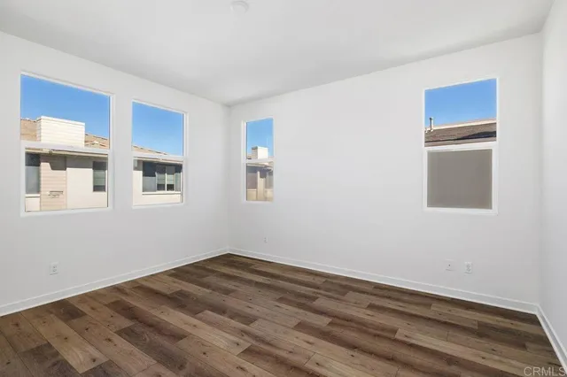 a room with a bed and a window