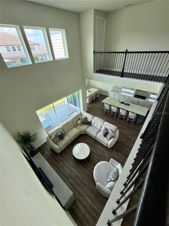 8441 Pk Clf Way Orlando, FL 32836 - Photo 21 of 59 a living room with furniture and wooden floor
