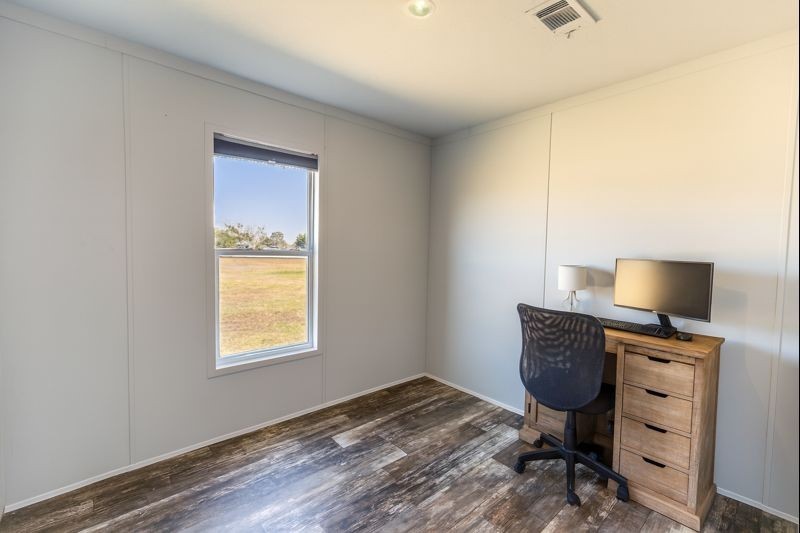2752 Remmert Road Bellville, TX 77418 - Photo 14 of 19 This second bedroom has possibilities for a home office, a bedroom, maybe even a nursery.