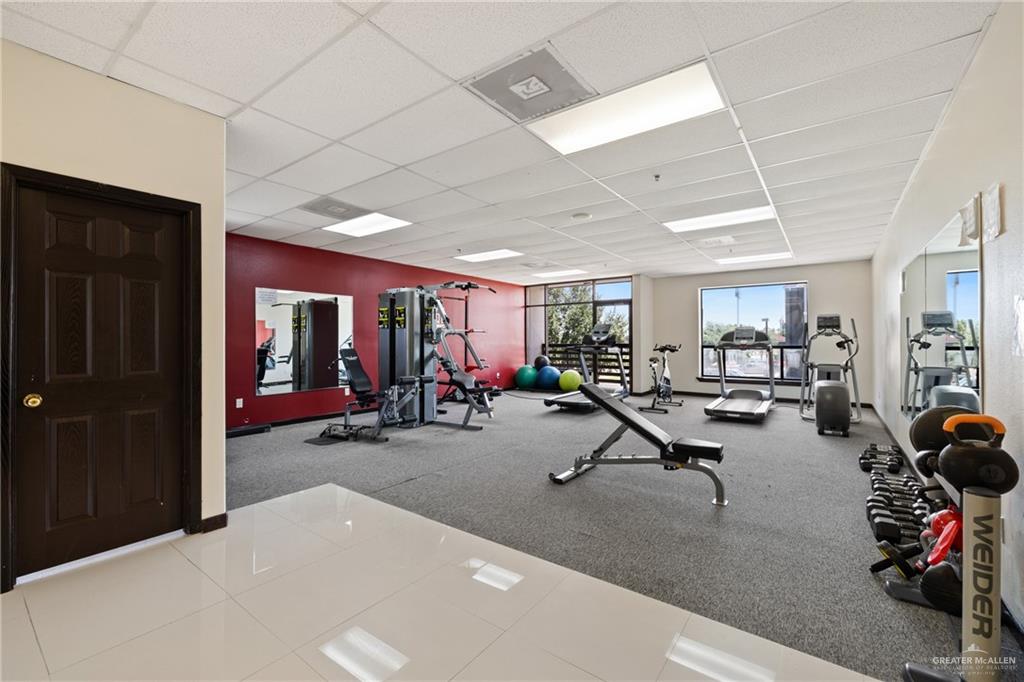 813 Travis Street, Unit 203 Mission, TX 78572 - Photo 18 of 30 a view of a room with gym equipment