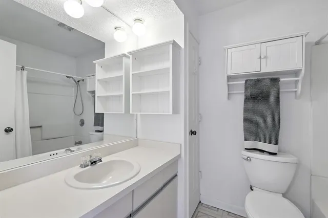 a bathroom with a bath tub and a shower