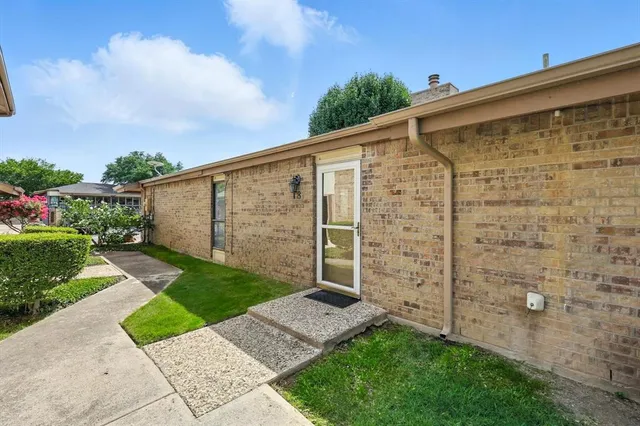 a view of a back yard of the house