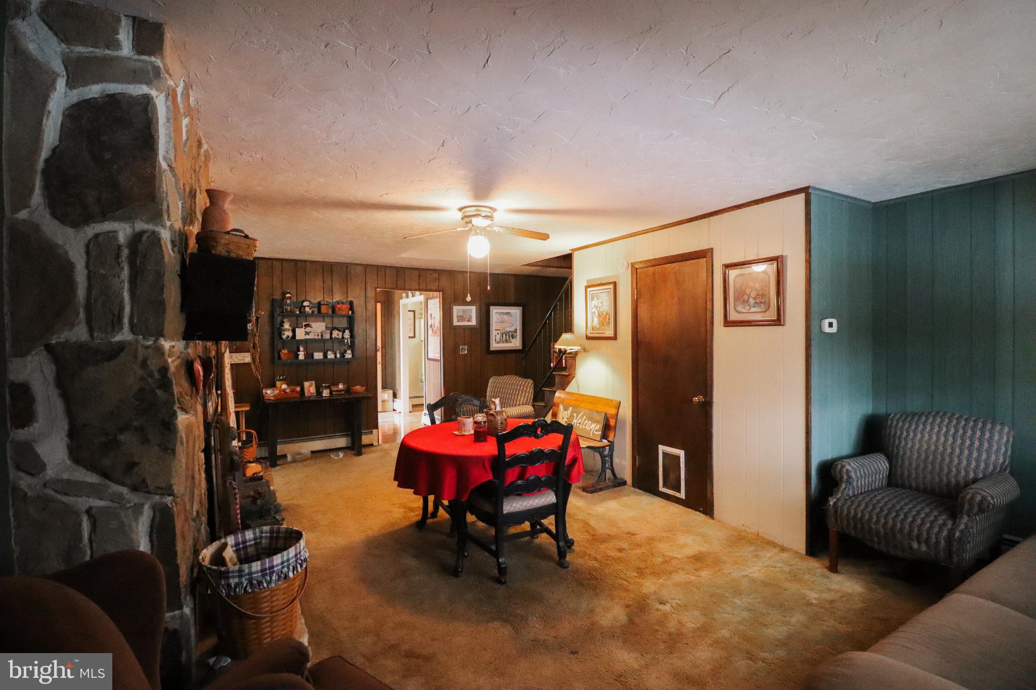 81 Rupp Road Gettysburg, PA 17325 - Photo 14 of 53 a living room with furniture a air conditioner vent and a window