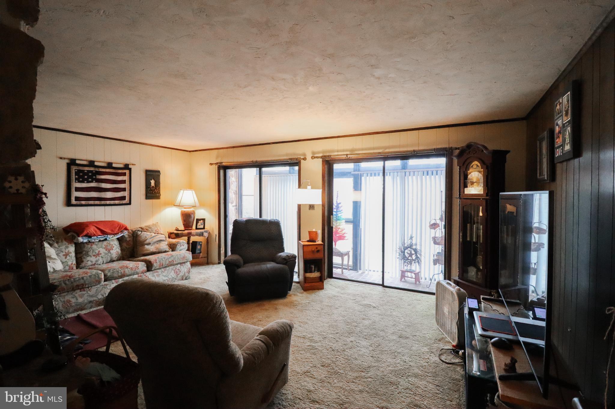 81 Rupp Road Gettysburg, PA 17325 - Photo 15 of 53 a living room with furniture a flat screen tv and a window