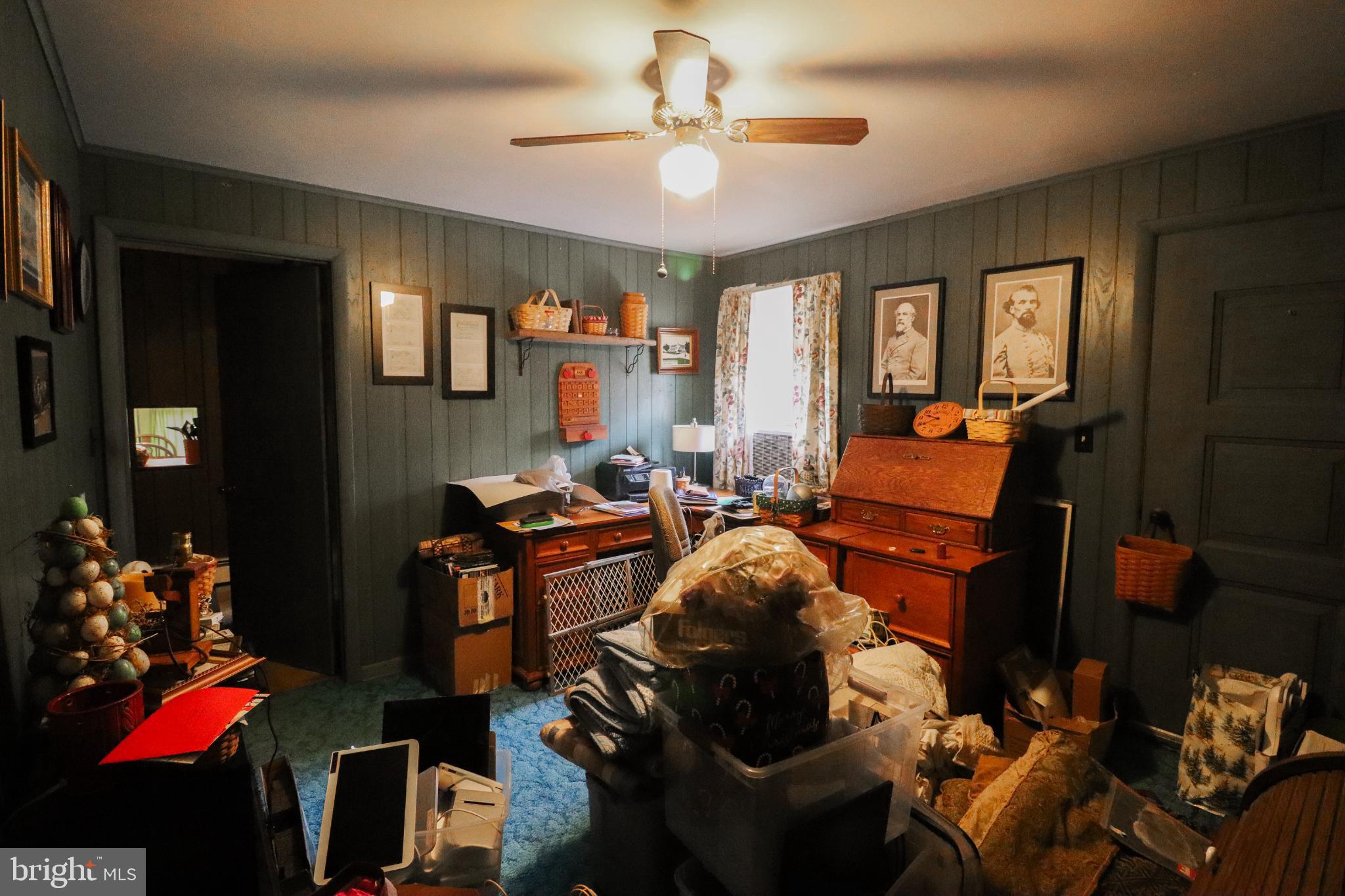 81 Rupp Road Gettysburg, PA 17325 - Photo 20 of 53 a living room with furniture a chandelier and a fireplace