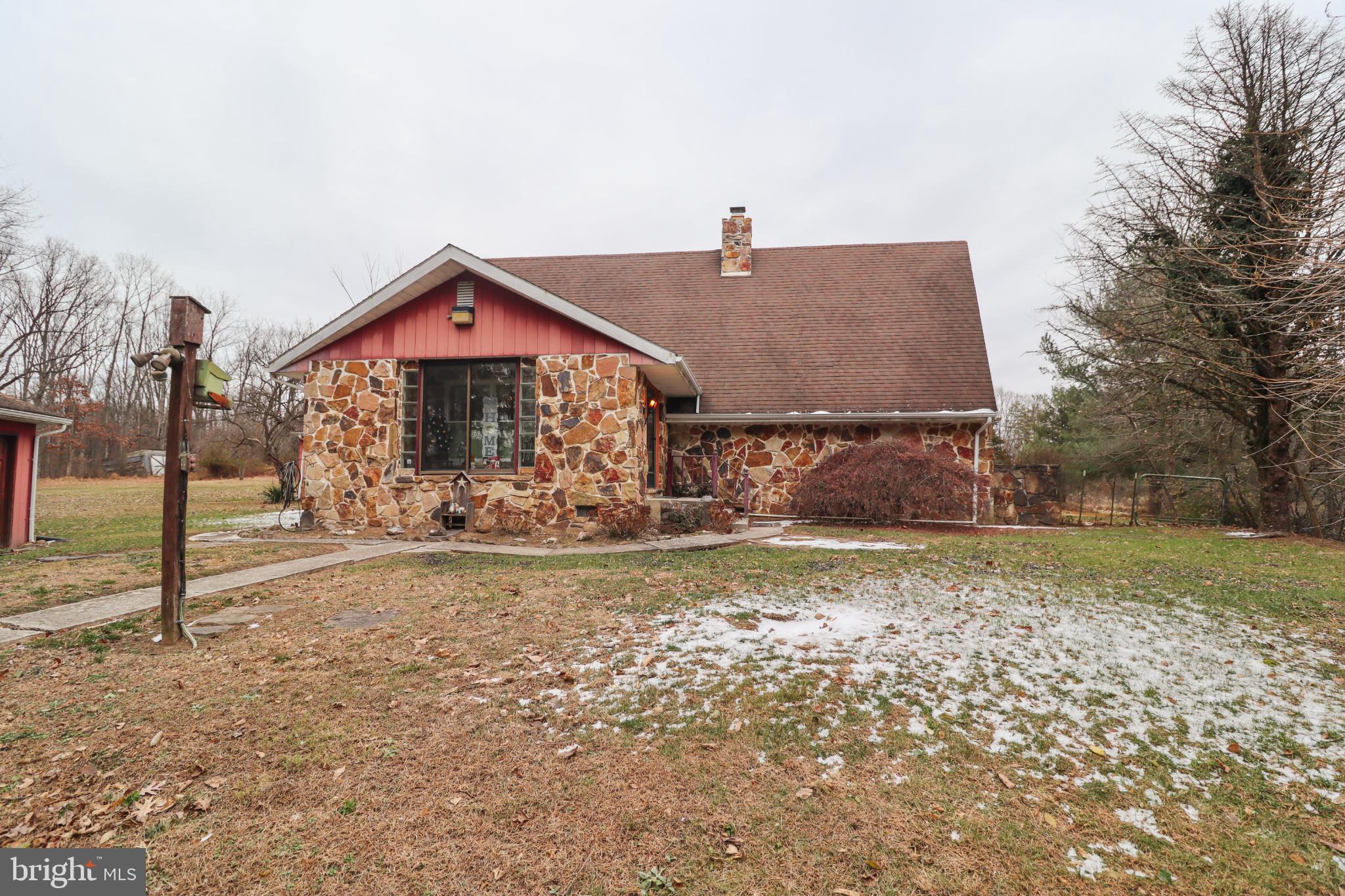 81 Rupp Road Gettysburg, PA 17325 - Photo 2 of 53 a front view of a house with a yard