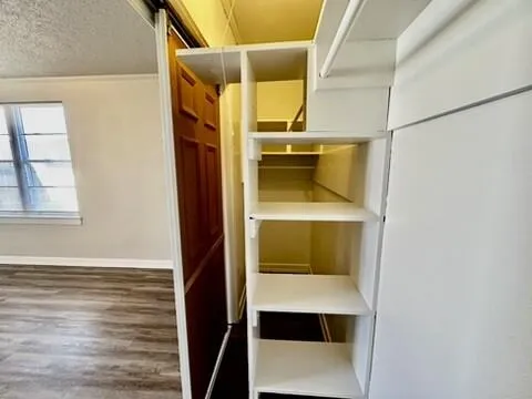 a view of entryway with wooden floor