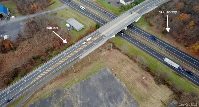a view of a balcony with a floor to ceiling window