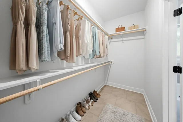 a view of an empty walk in closet