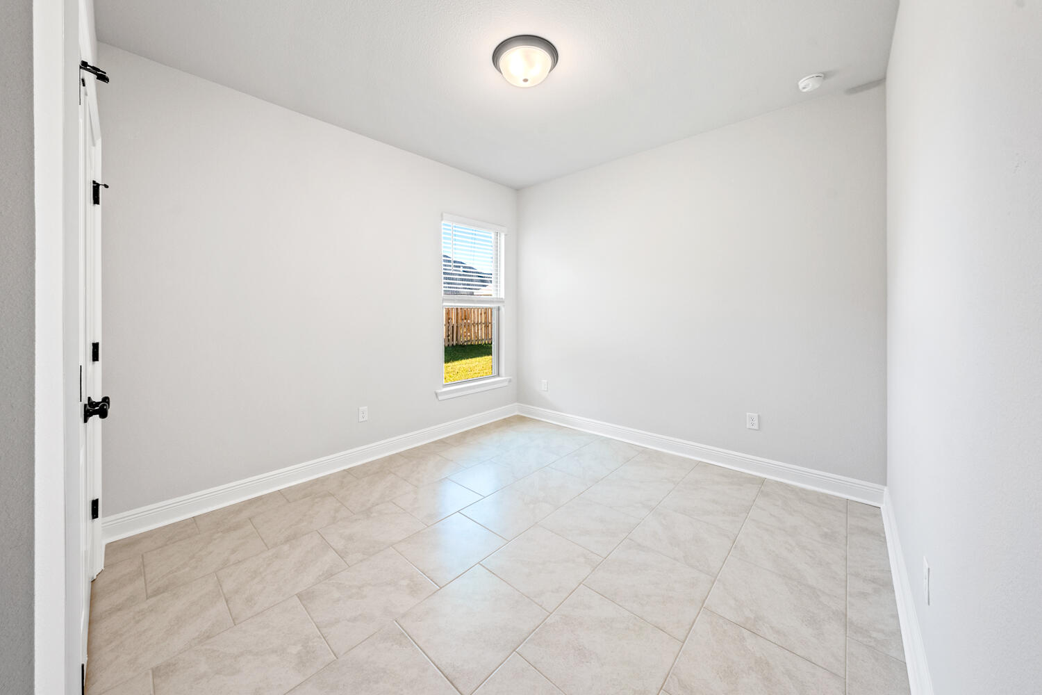 130 Hydrangea Boulevard Freeport, FL 32439 - Photo 15 of 21 an empty room with windows