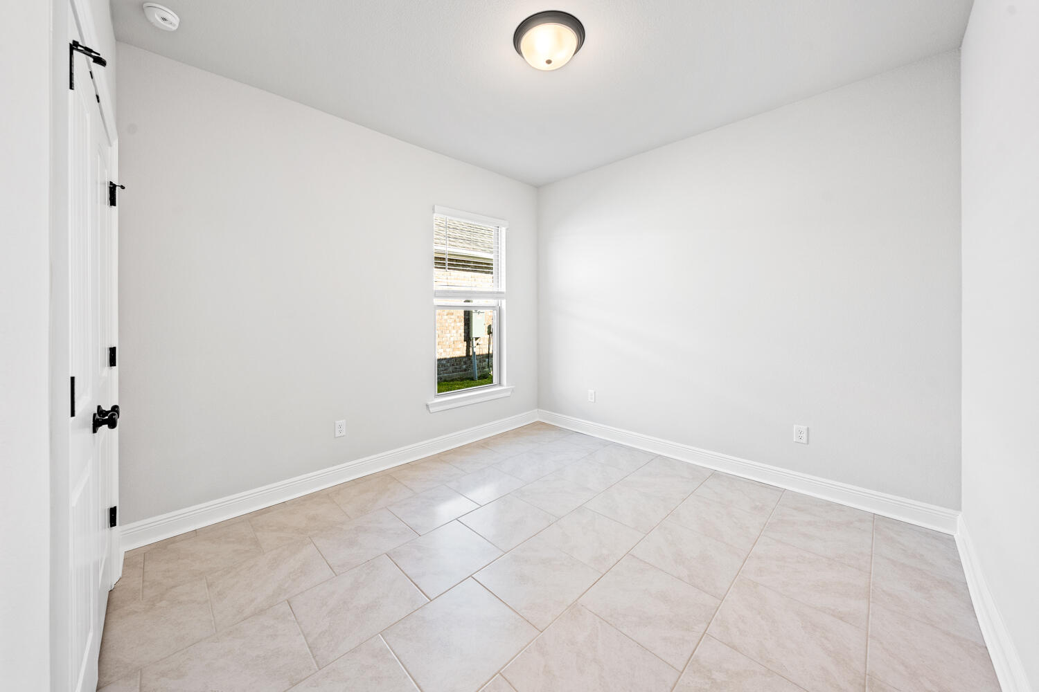 130 Hydrangea Boulevard Freeport, FL 32439 - Photo 17 of 21 an empty room with windows