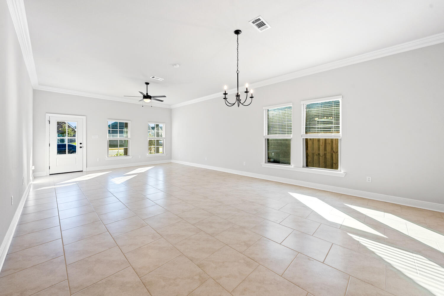 130 Hydrangea Boulevard Freeport, FL 32439 - Photo 8 of 21 a view of an empty room with a window