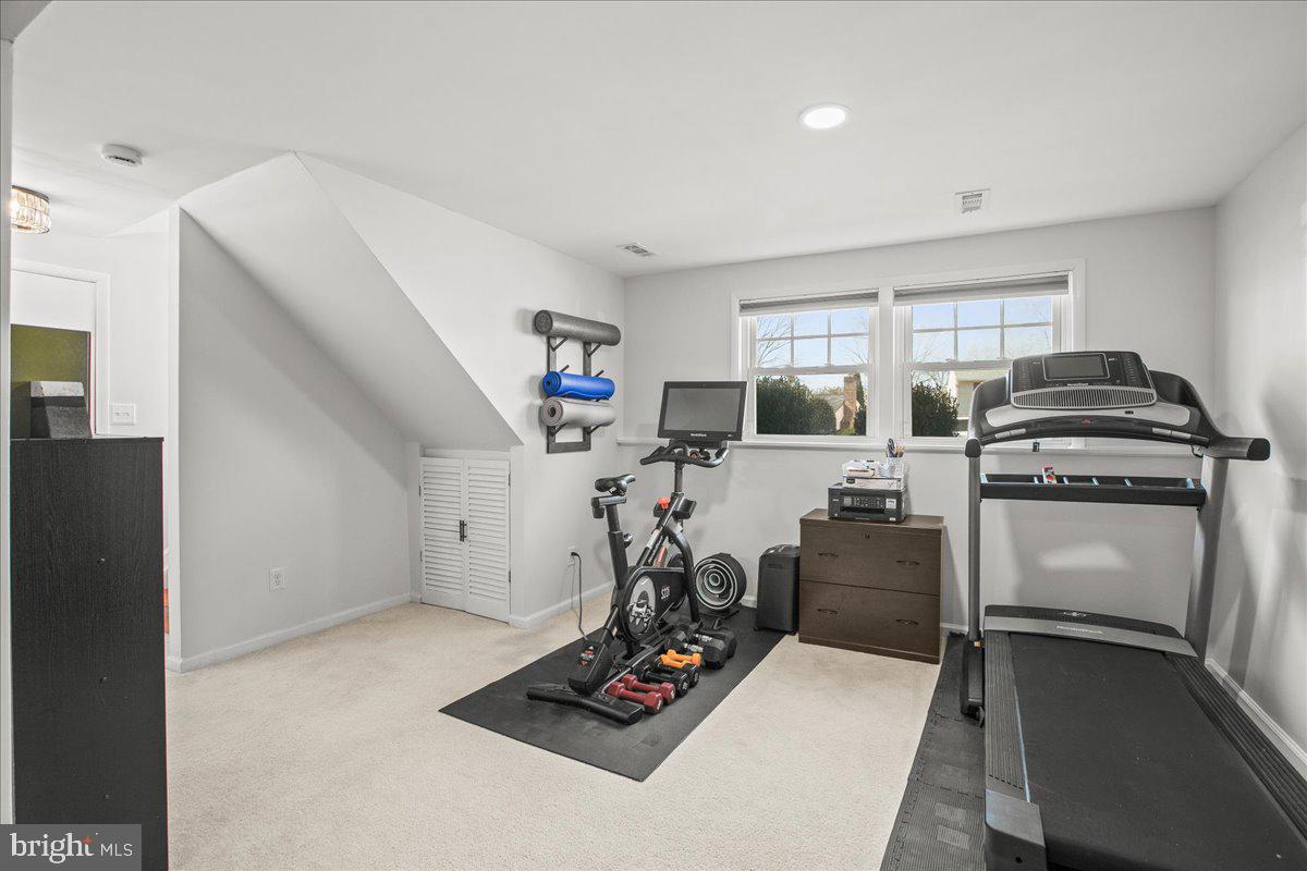 5829 Parakeet Drive Burke, VA 22015 - Photo 23 of 27 a room with furniture and white walls