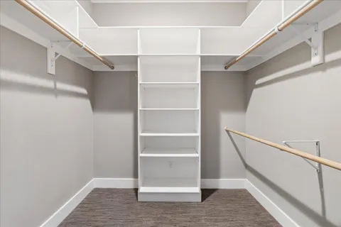 a view of an empty walk in closet