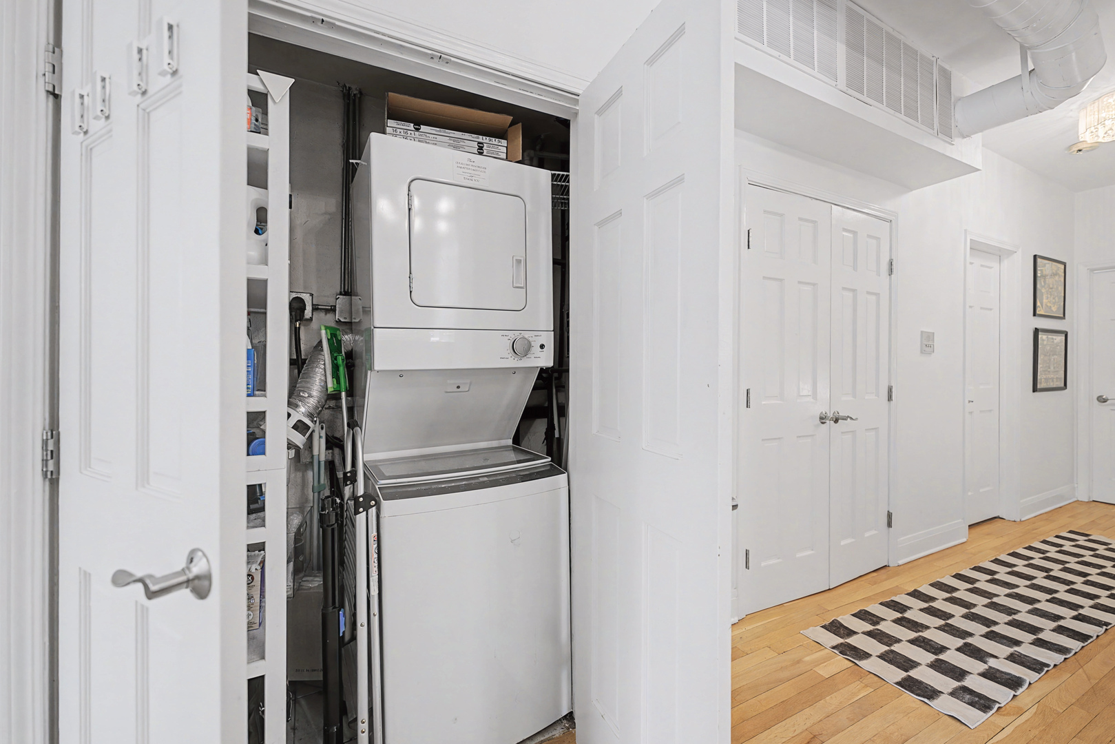 832 West Adams Street, Unit 2 Chicago, IL 60607 - Photo 9 of 23 a view of a closet area with wooden floor