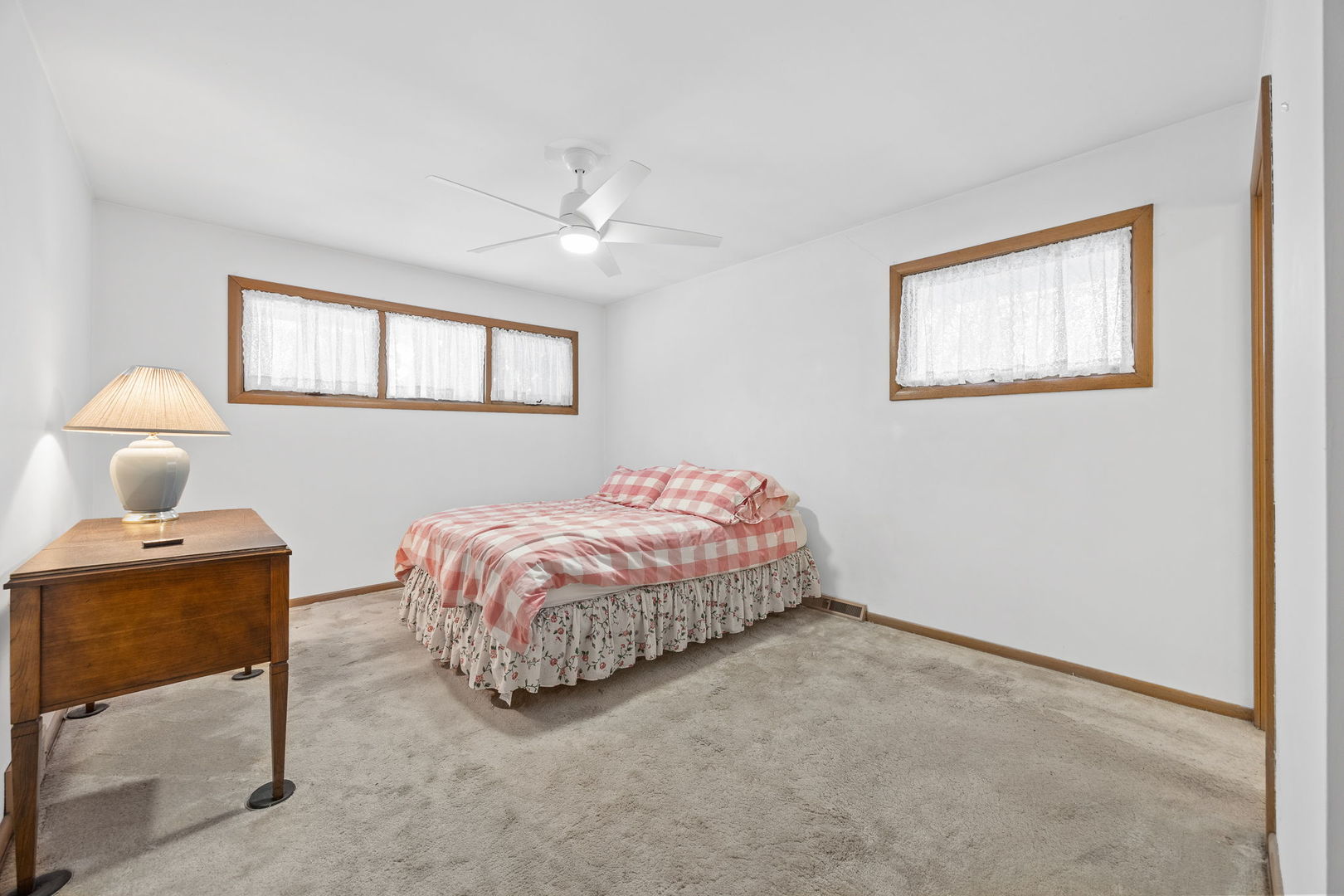 1927 Warrenville Road Lisle, IL 60532 - Photo 21 of 41 a bedroom with a bed and a window