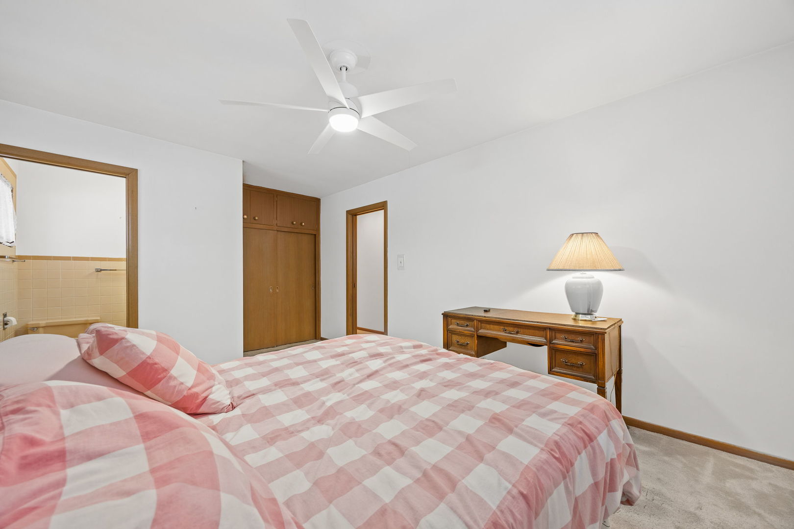 1927 Warrenville Road Lisle, IL 60532 - Photo 22 of 41 a bedroom with a bed and window