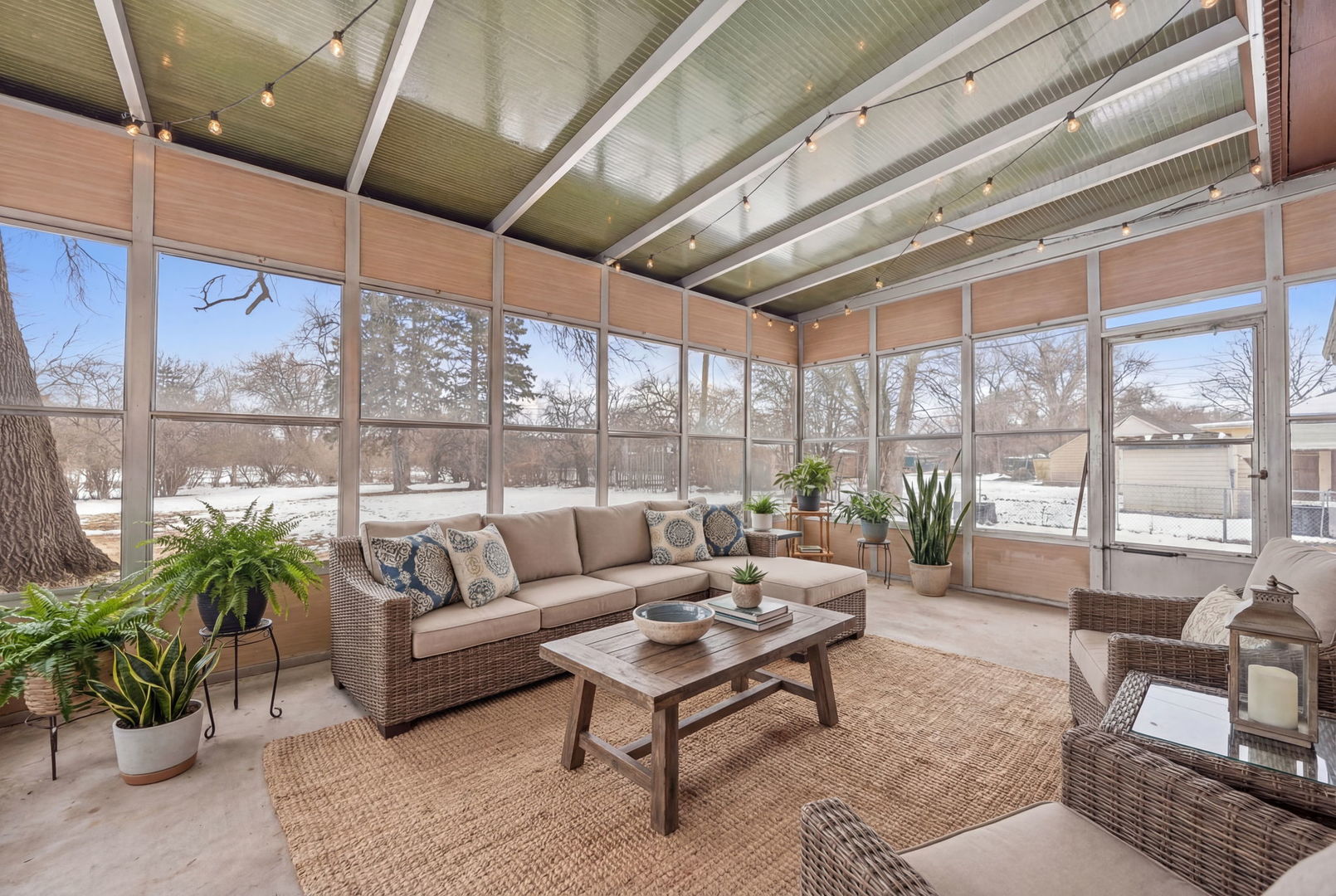 1927 Warrenville Road Lisle, IL 60532 - Photo 28 of 41 a living room with patio furniture and a potted plant