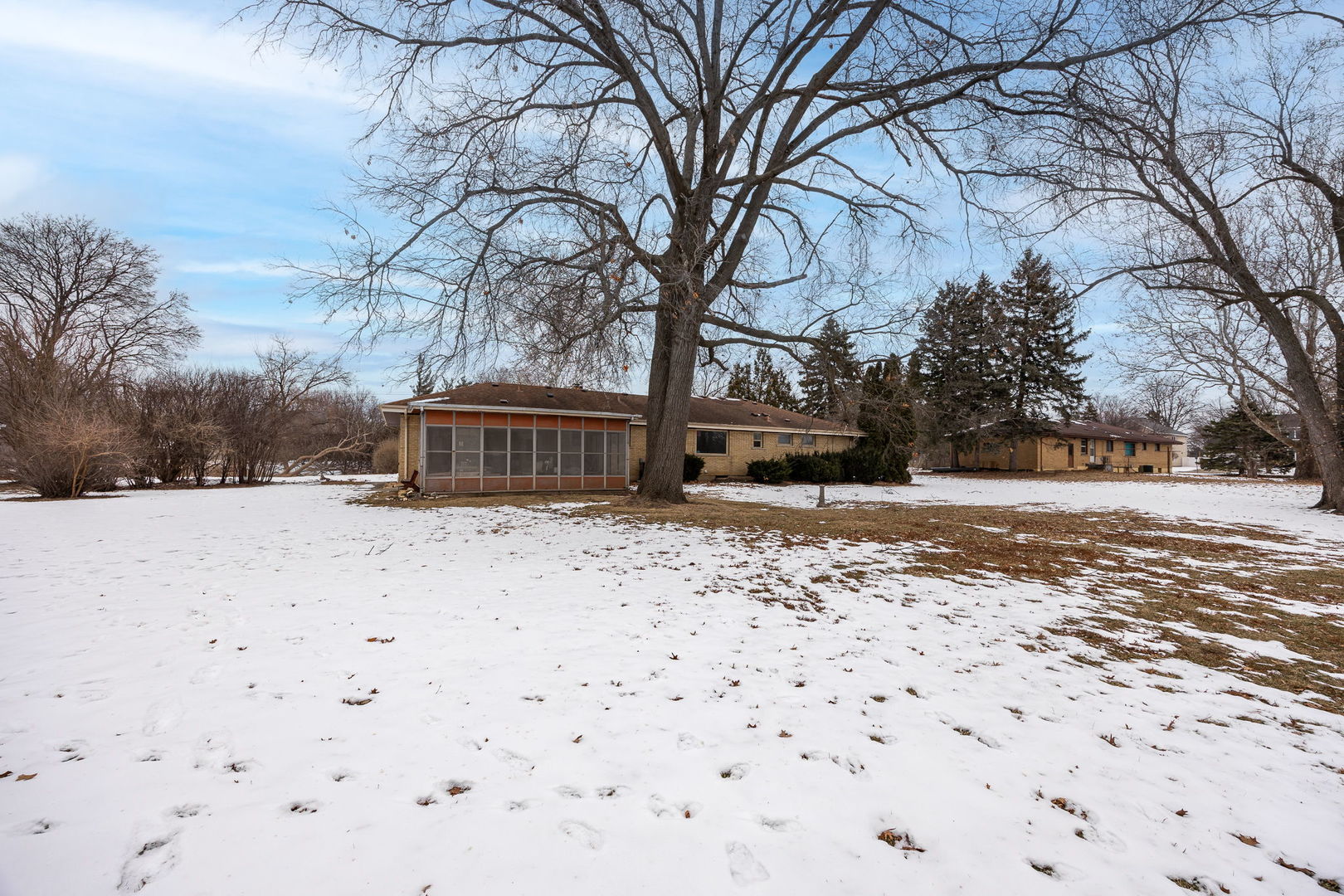 1927 Warrenville Road Lisle, IL 60532 - Photo 34 of 41 a street view covered with snow