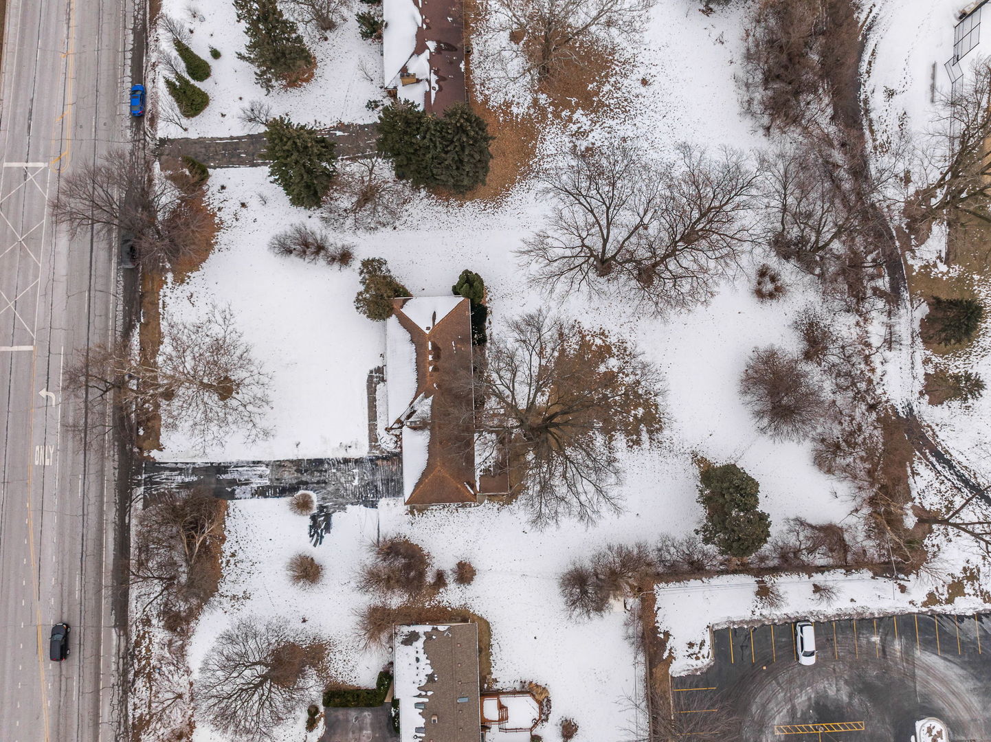 1927 Warrenville Road Lisle, IL 60532 - Photo 41 of 41 a view of a yard with snow on side of road