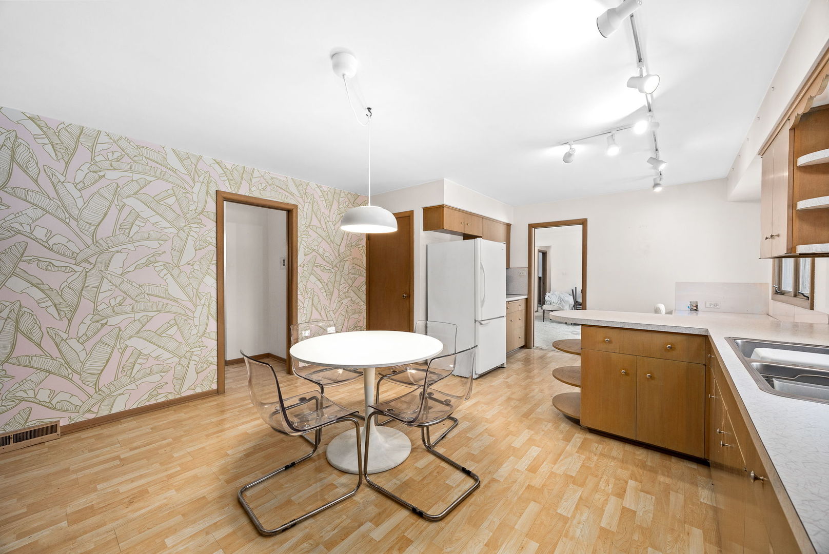 1927 Warrenville Road Lisle, IL 60532 - Photo 7 of 41 a living room with furniture and a wooden floor
