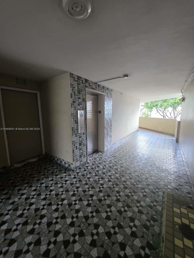 1710 Northeast 191st Street, Unit 3013 Miami, FL 33179 - Photo 22 of 23 a view of a back yard